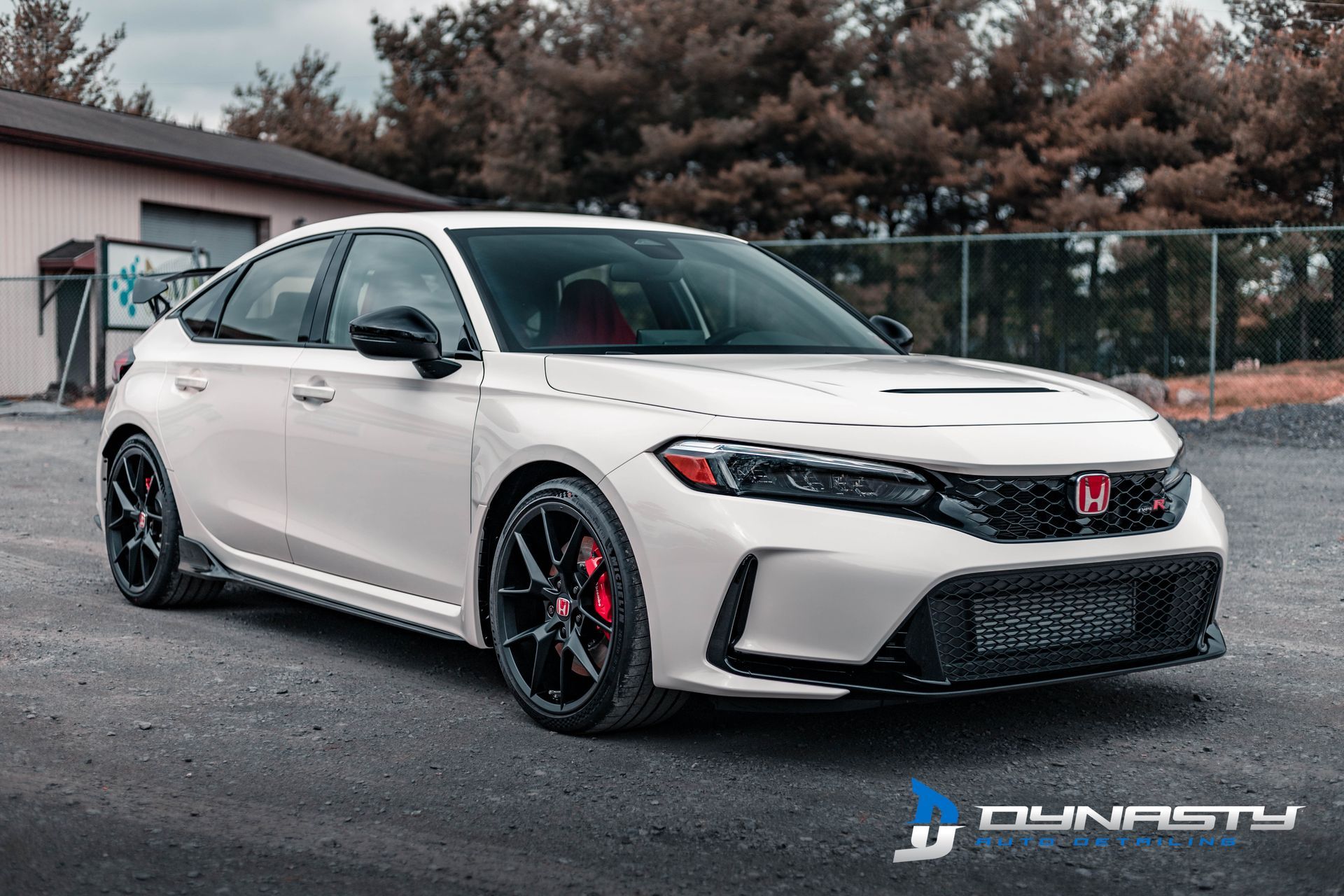 Detailing - A white Honda Civic Type R is parked in a parking lot.