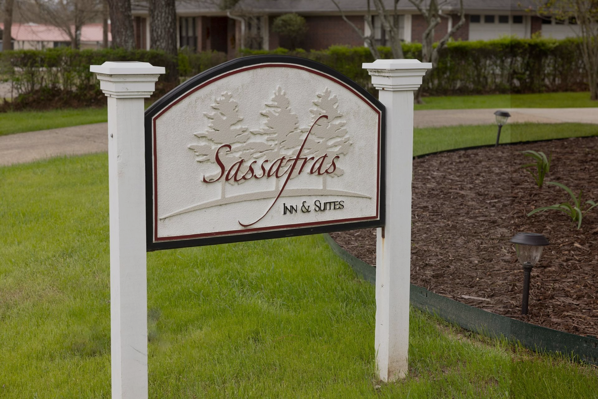 Sign for Sassafras by J.W. Smith in a landscaped apartment complex