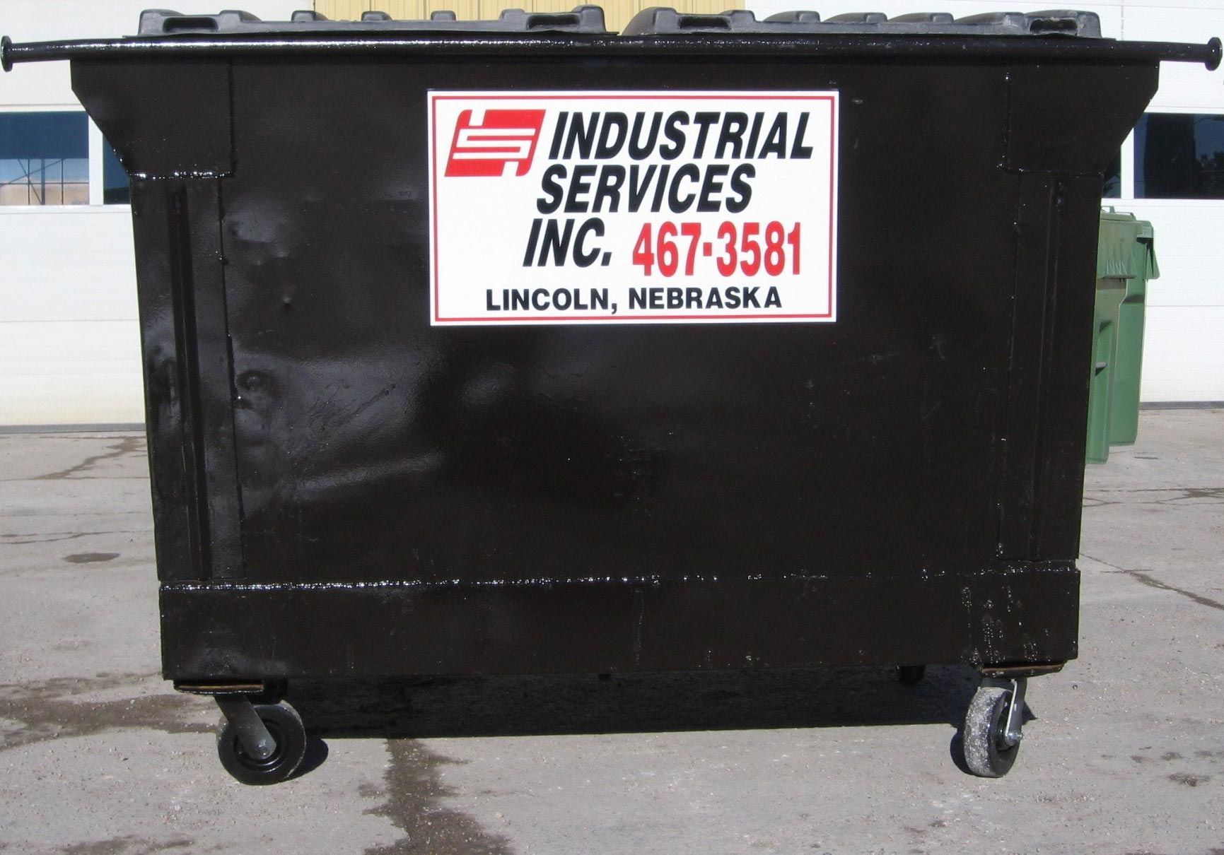 Black Dumpster — Lincoln, NE — Industrial Services Inc. Black Dumpster — Lincoln, NE — Industrial Services Inc.