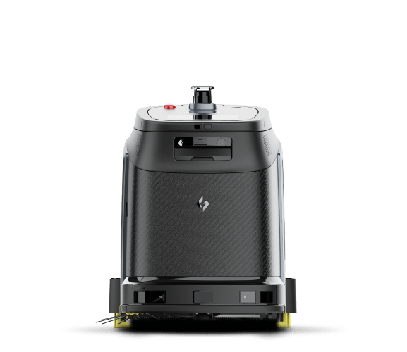 A black robot is sitting on a white surface.
