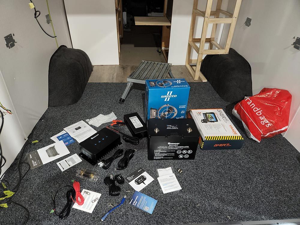 A Bunch of Boxes Are Sitting on A Table in A Room — Genesis Automotive Services in Lavington, NSW