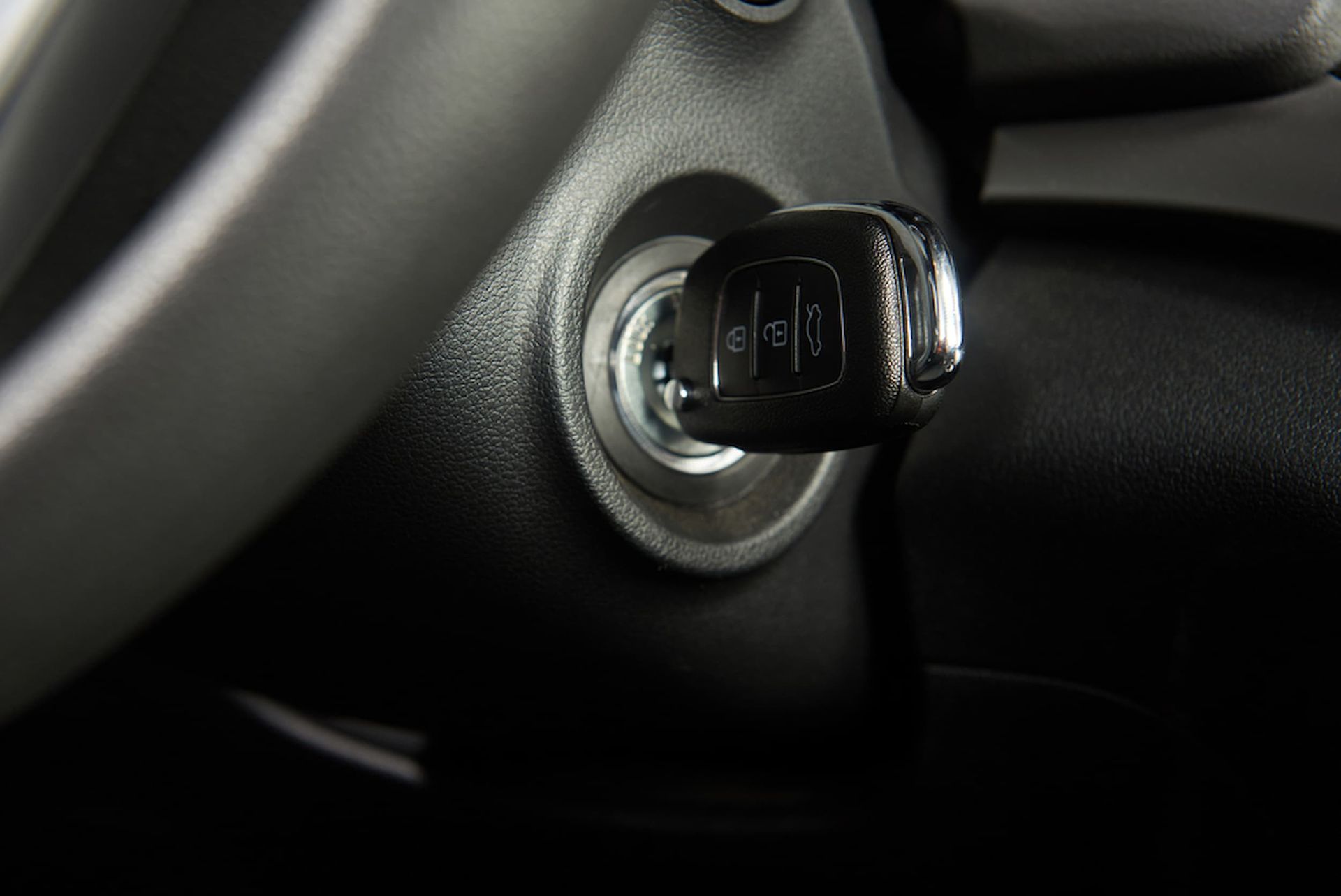 A Close up Of a Car Key in The Ignition — Genesis Automotive Services in Lavington, NSW