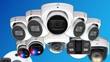 Collection of white security cameras against a blue background.