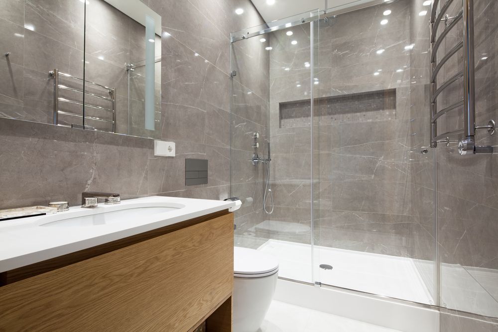 Modern Bathroom With Gray Tile Walls — CKS Electrical and Air Conditioning in Alice Springs, NT