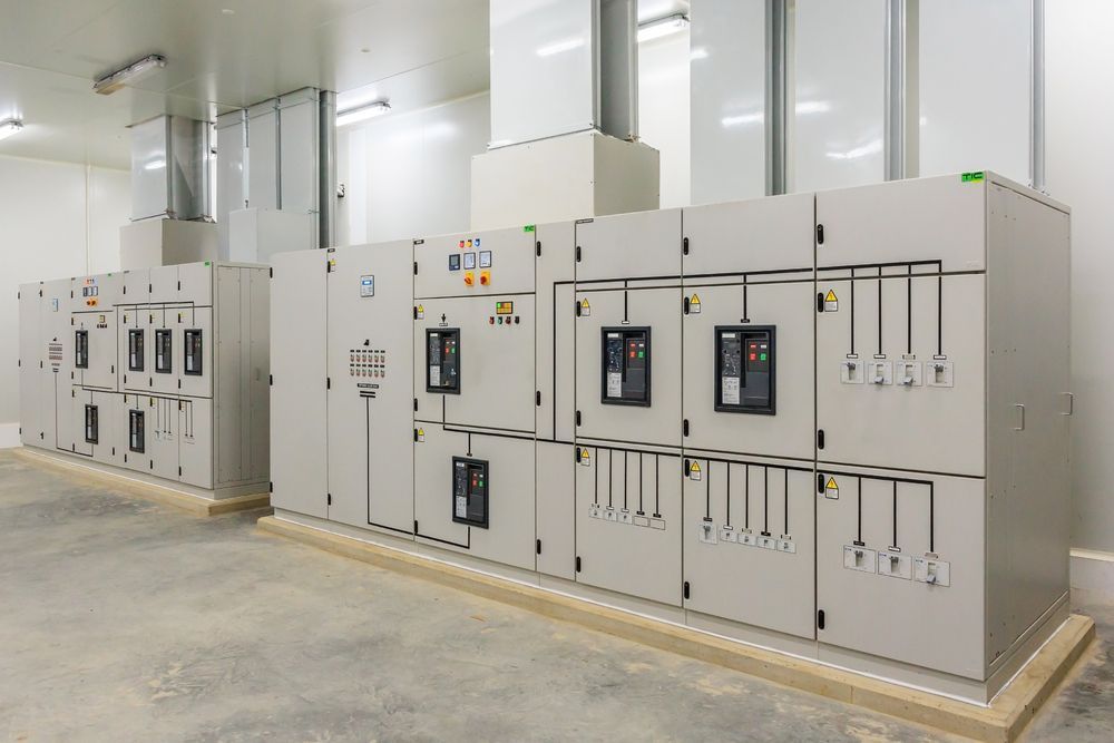 Gray Electrical Control Panels in an Indoor Industrial Setting — CKS Electrical and Air Conditioning in Ciccone, NT