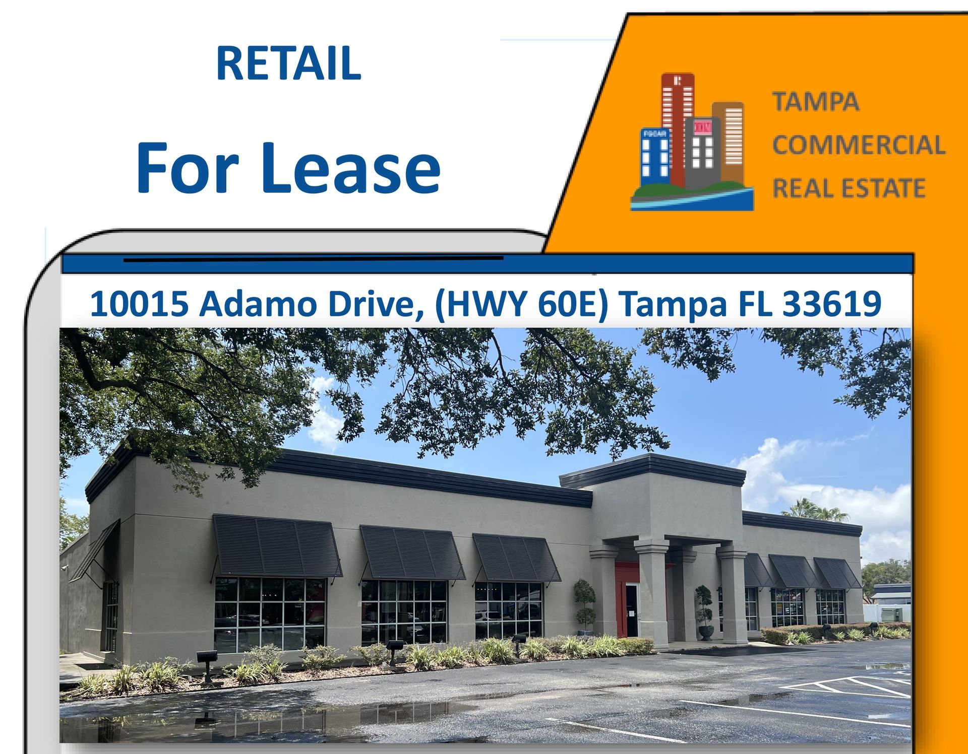 A beige retail building for lease at 10015 Adamo Drive, Tampa FL, featuring black window awnings and a parking lot.