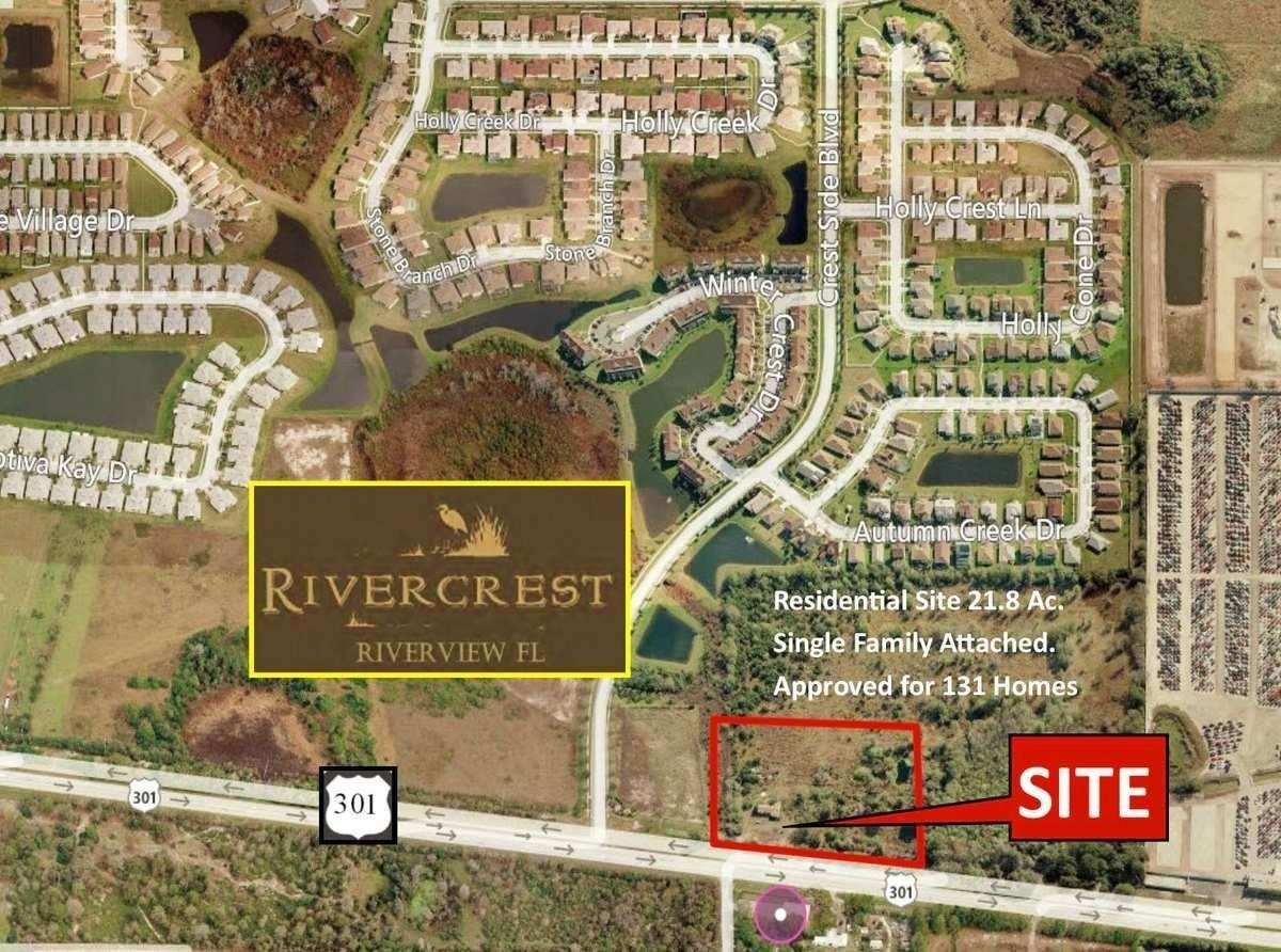 Aerial site map of Rivercrest neighborhood with the red-highlighted lot labeled “SITE” near roads and homes
