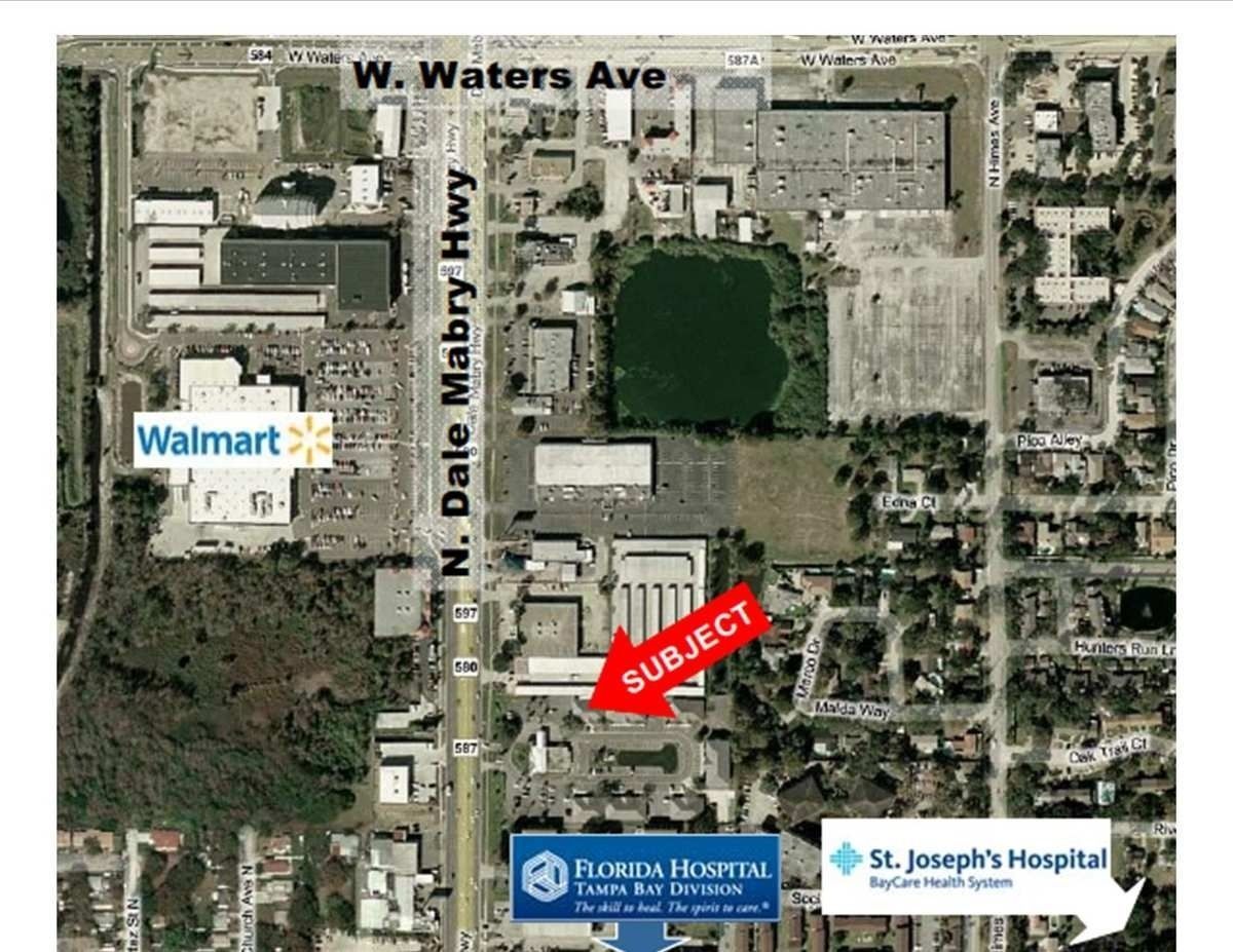 Aerial map with Walmart, Florida Hospital, St. Joseph’s Hospital, and a red arrow labeled “Subject.”