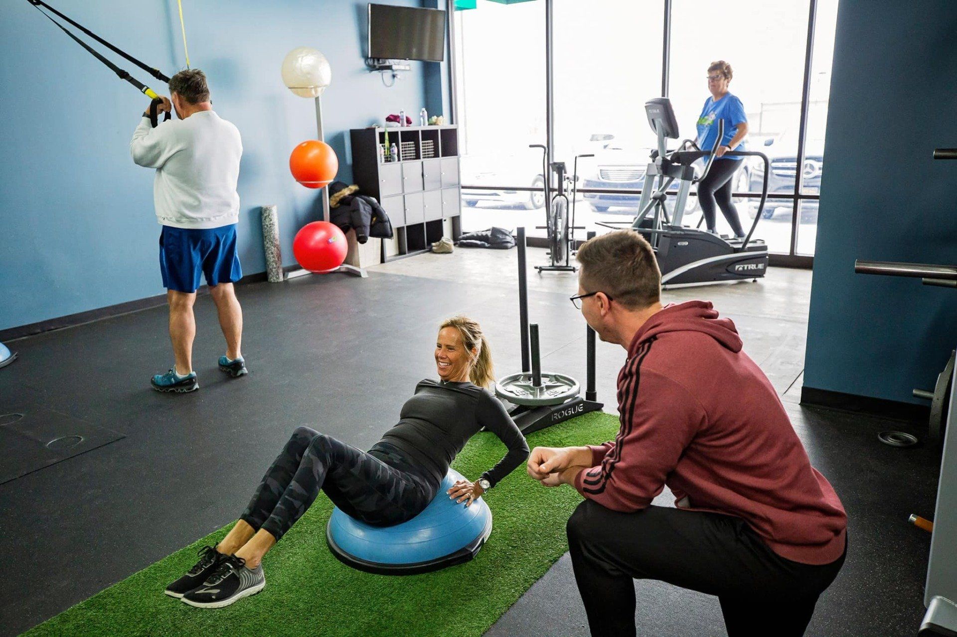 Woman Working Out — Overland Park, KS — Hustle and Heart Fitness