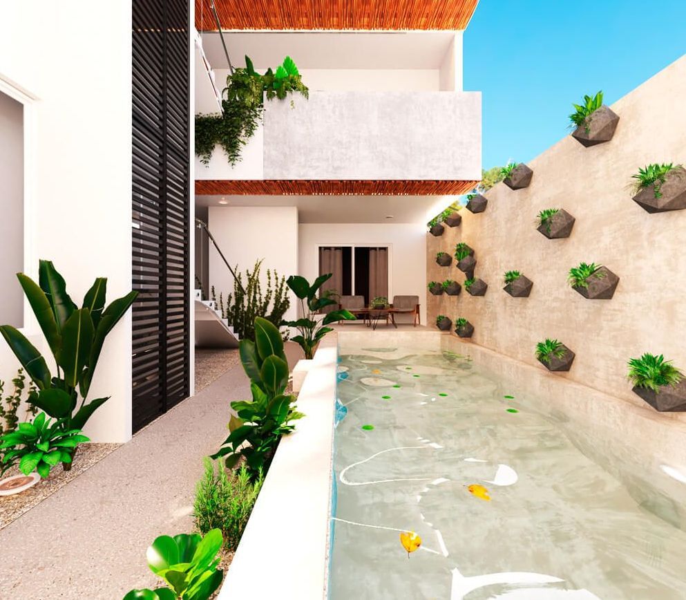 Exterior of modern building with a pool and wall-mounted plants.