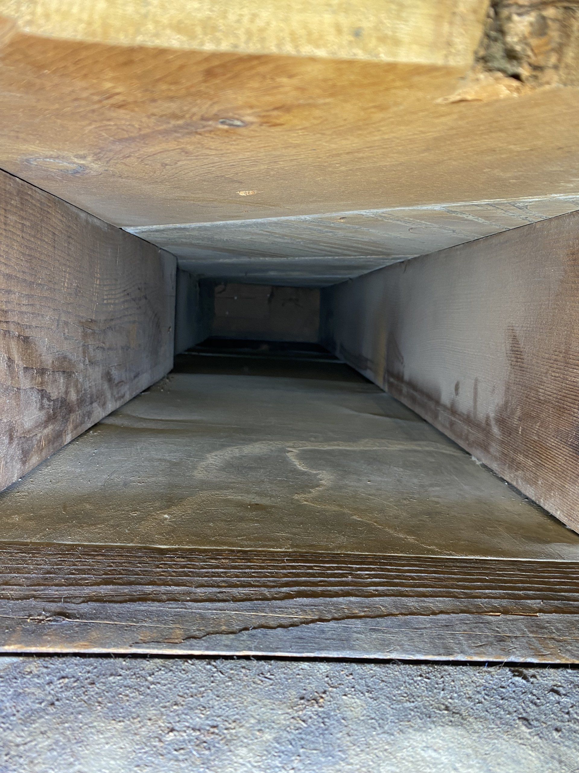 It looks like a tunnel with stairs going down it.