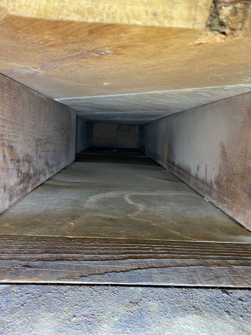 It looks like a tunnel with stairs going down it.