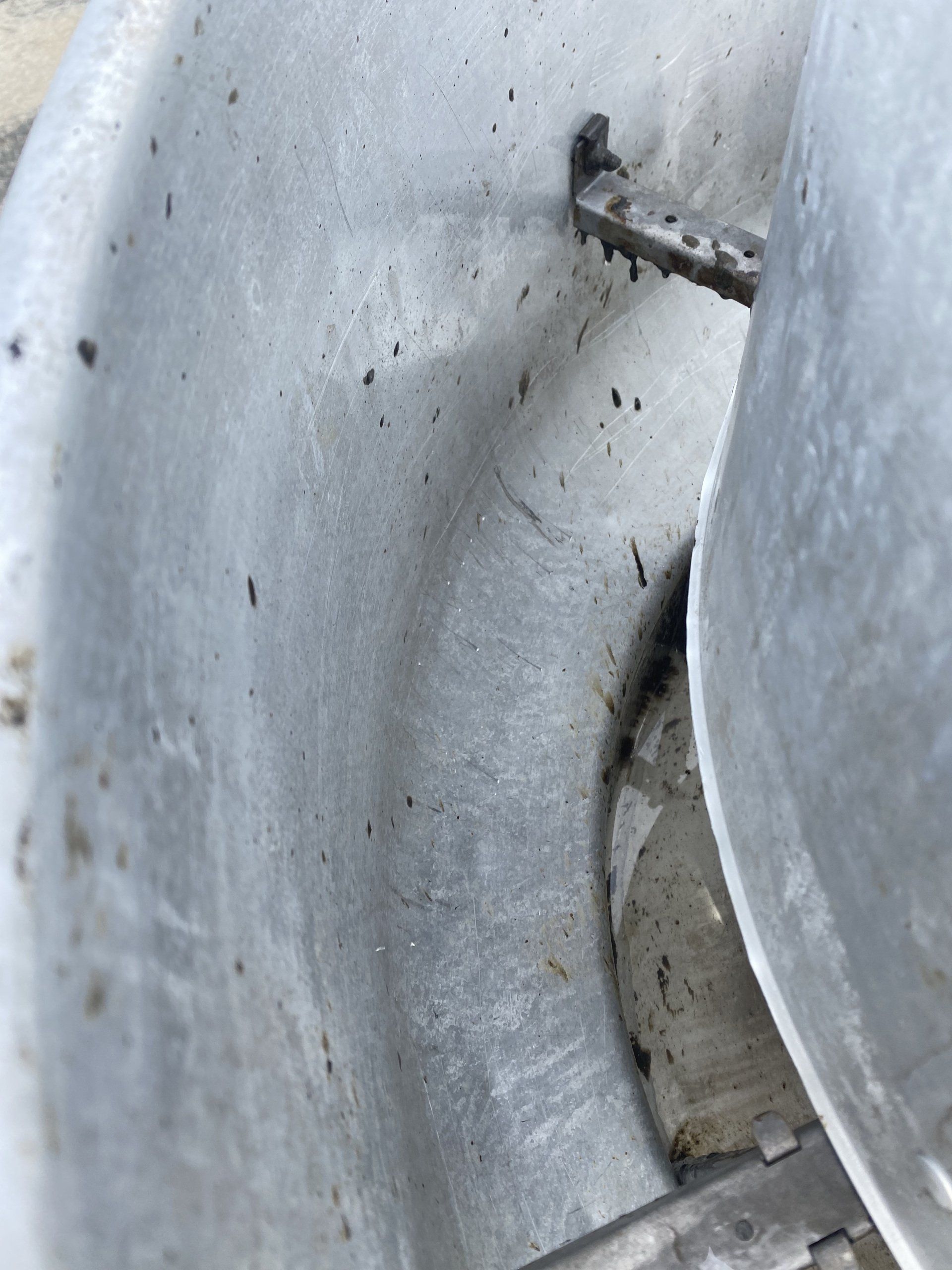 A close up of a metal pot with a lid on it.