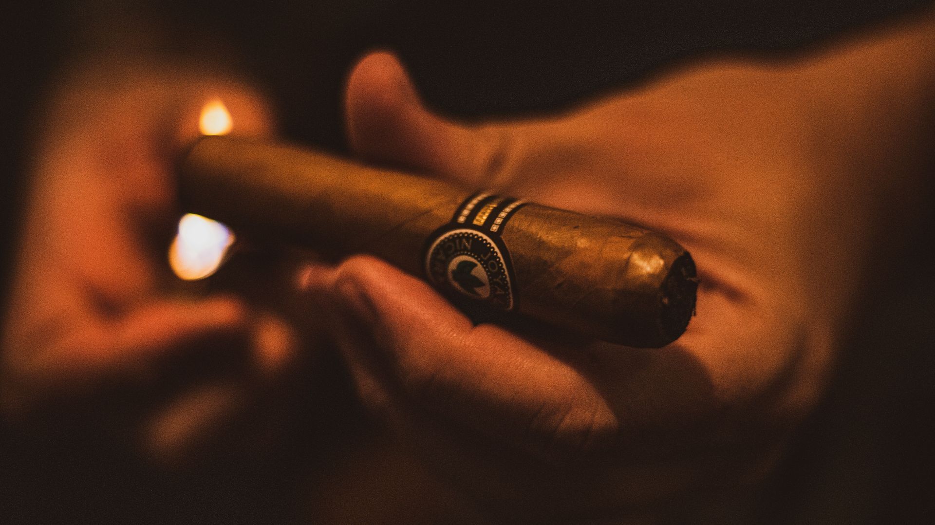 Man Lighting Cigar in Ocala, FL