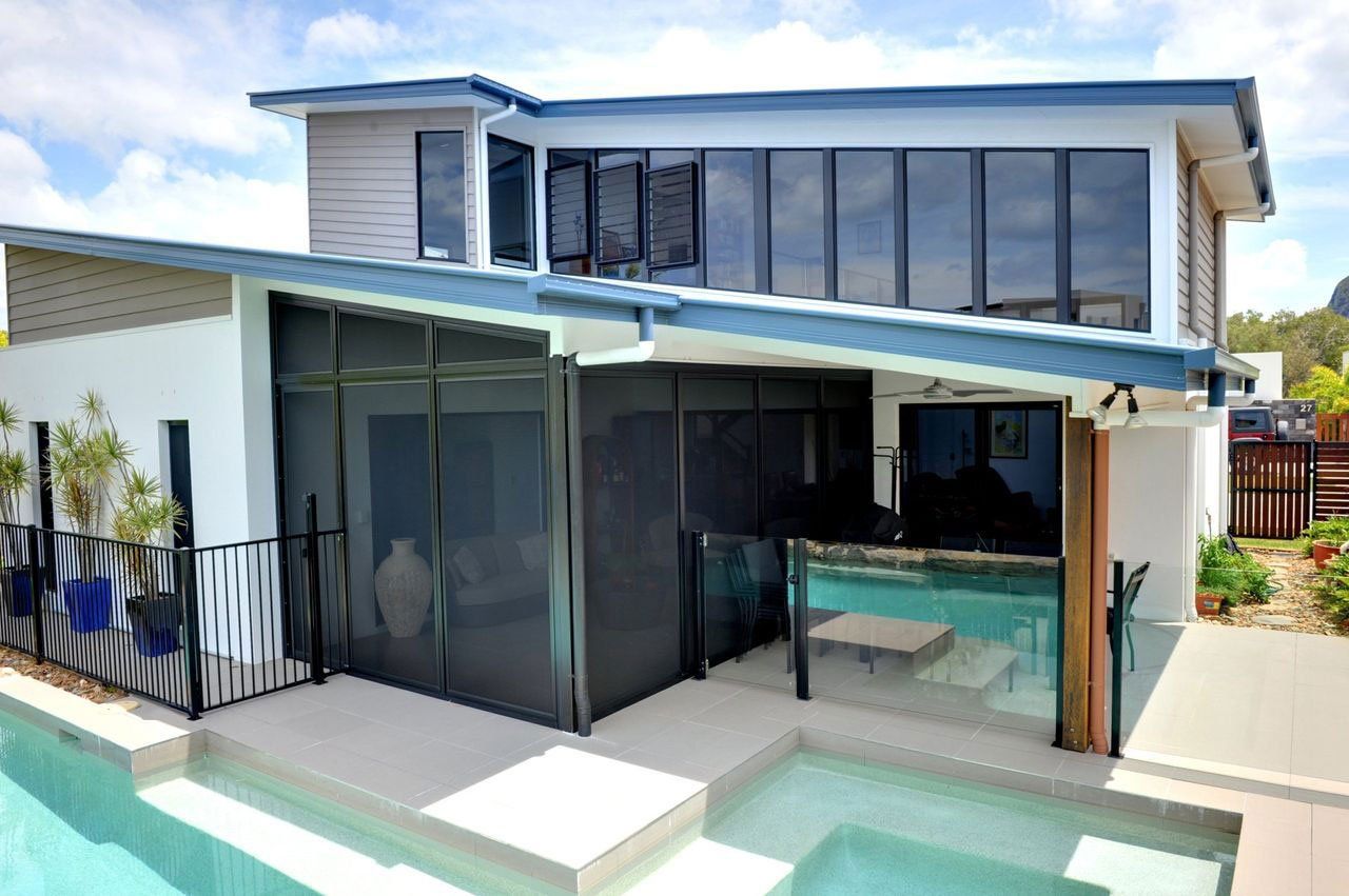 Image of stainless steel screened patio enclosure