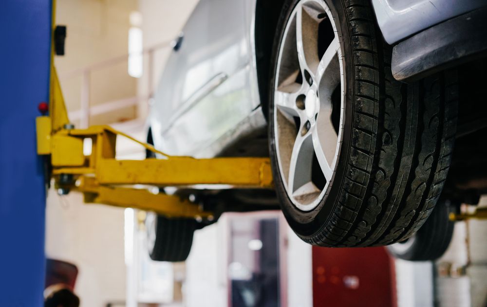 Close up of a car tire being prepare for repair.
