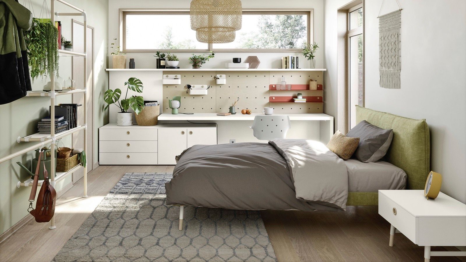 Camera da letto con scrivania, letto e scaffali. Colori verde chiaro e bianco, piante, luce naturale e stile boho.