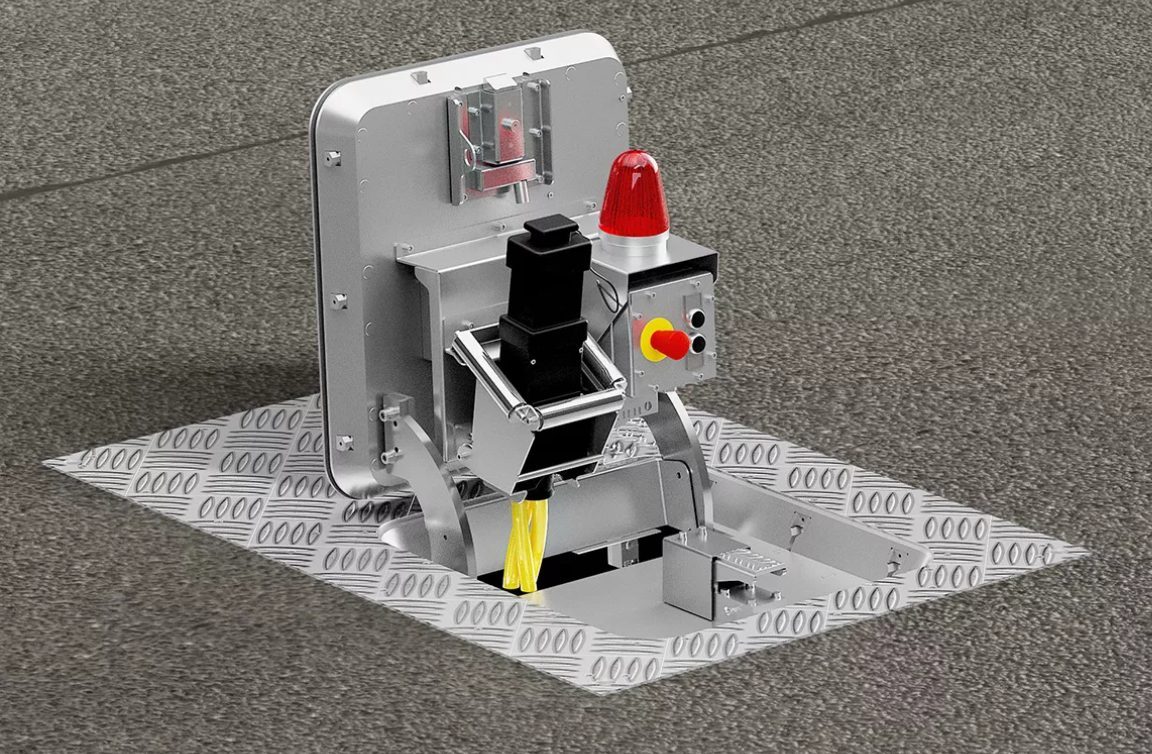 Un robot est assis sur une plate-forme métallique au sol.