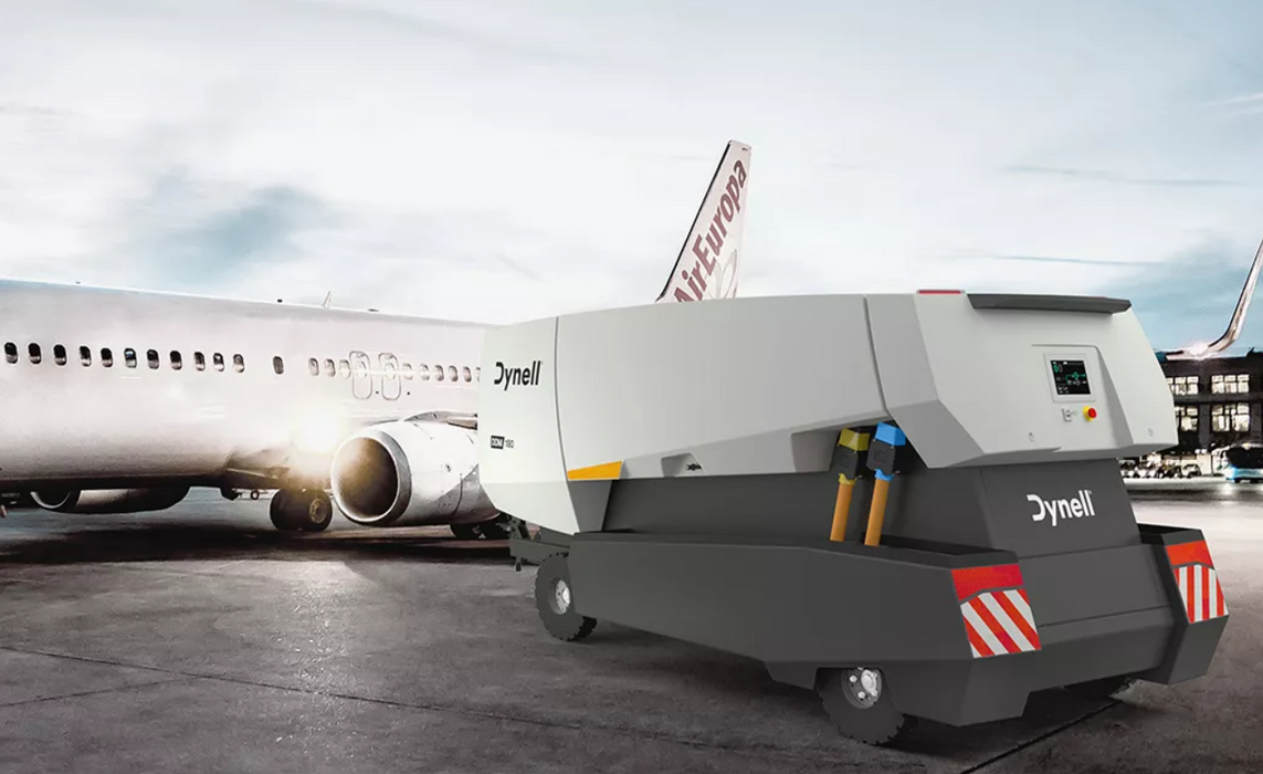 An airplane is being fueled by a tanker truck