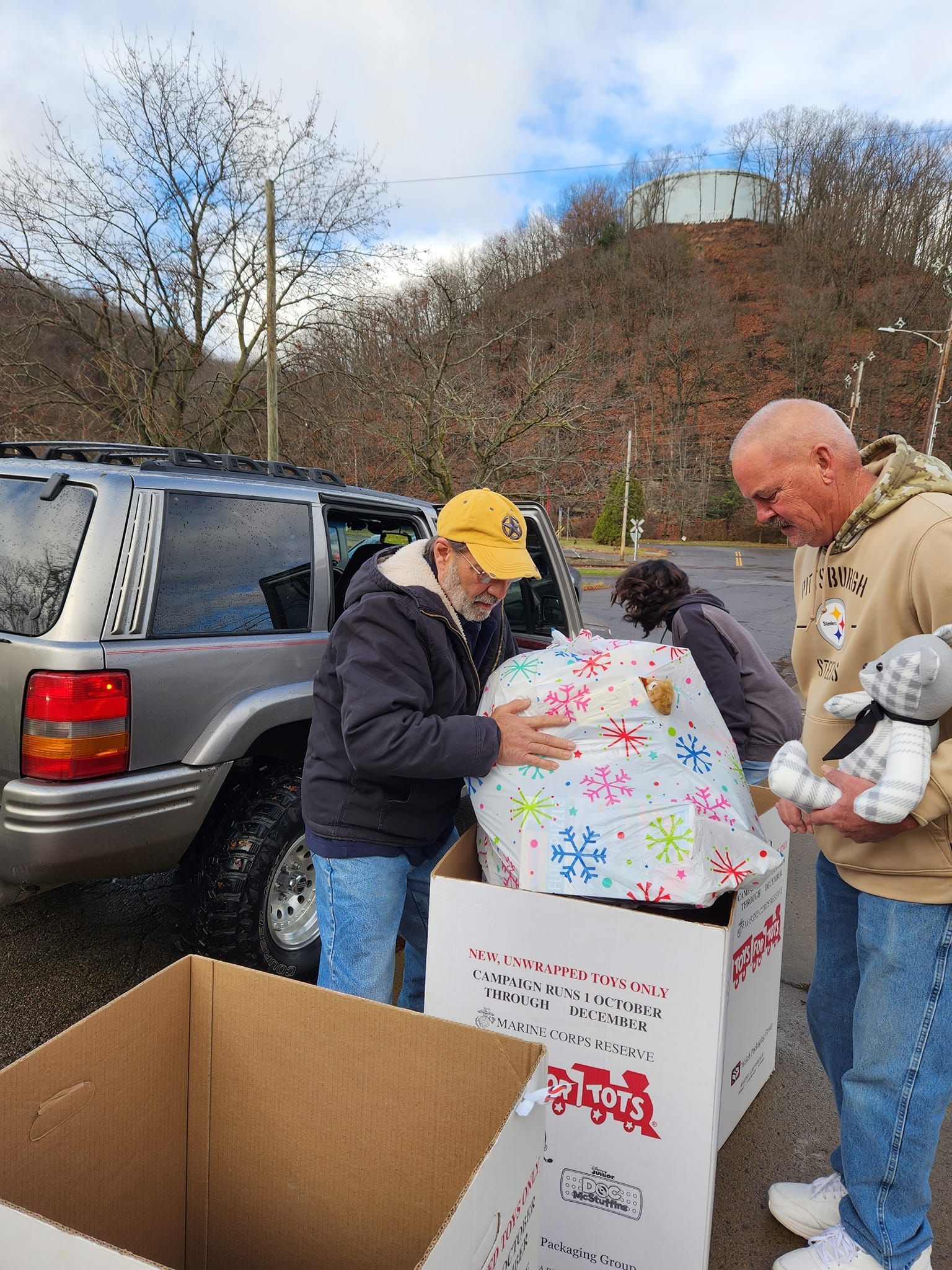 Toys For Tots Gifts Charity | Action Auto Service