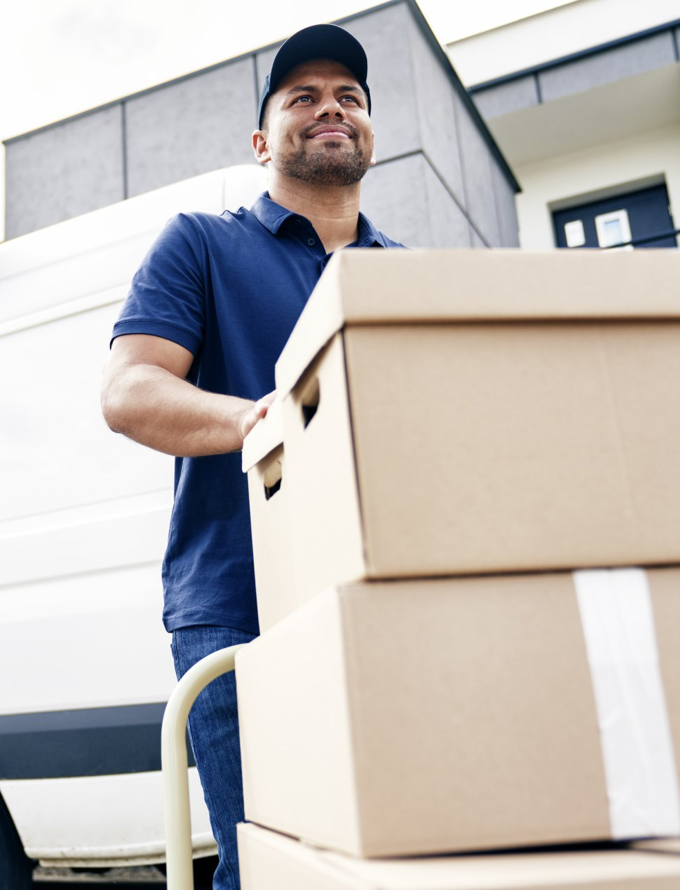 a commercial moving guy helping moving boxes