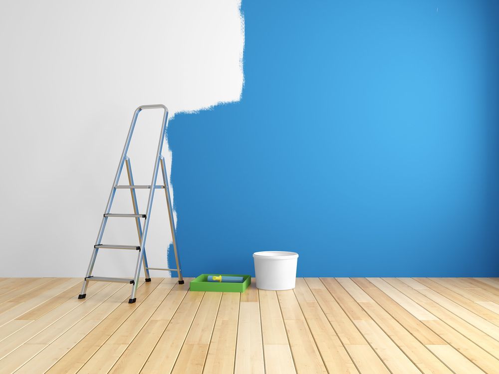 An Empty Room With A Ladder, A Paint Bucket, And A Wall Painted Blue — Strait Edge Painting In Tweed Heads South, NSW