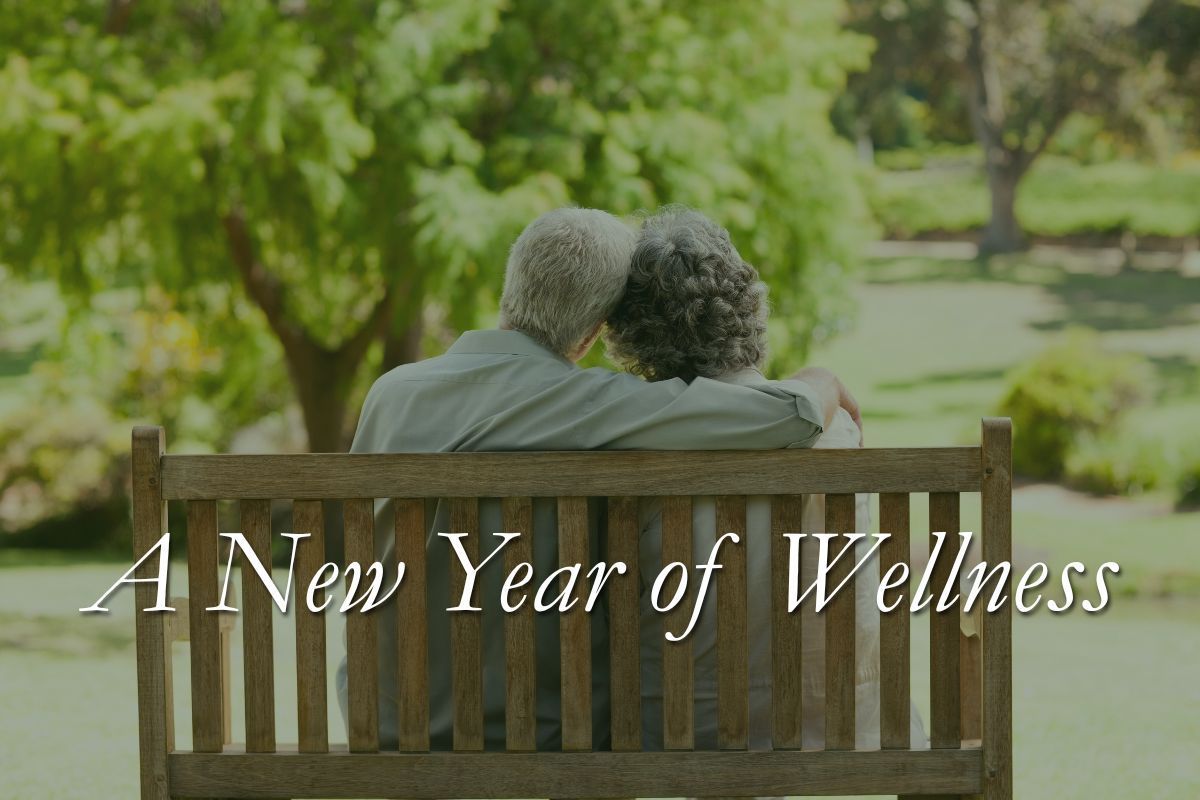 Couple sitting on a park bench, embracing. Text overlay: 