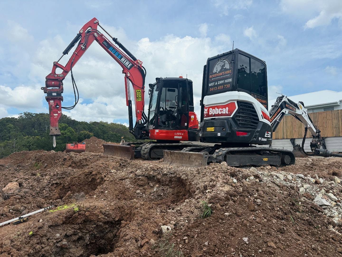 Two Excavators on a Construction Site — Borehams Hire In Meridan Plains, QLD