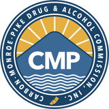 The logo for the monroe pike drug and alcohol commission