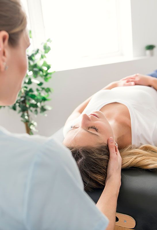 Woman Receiving Head And Neck Massage From A Professional — Integrate Health In Ooralea, QLD