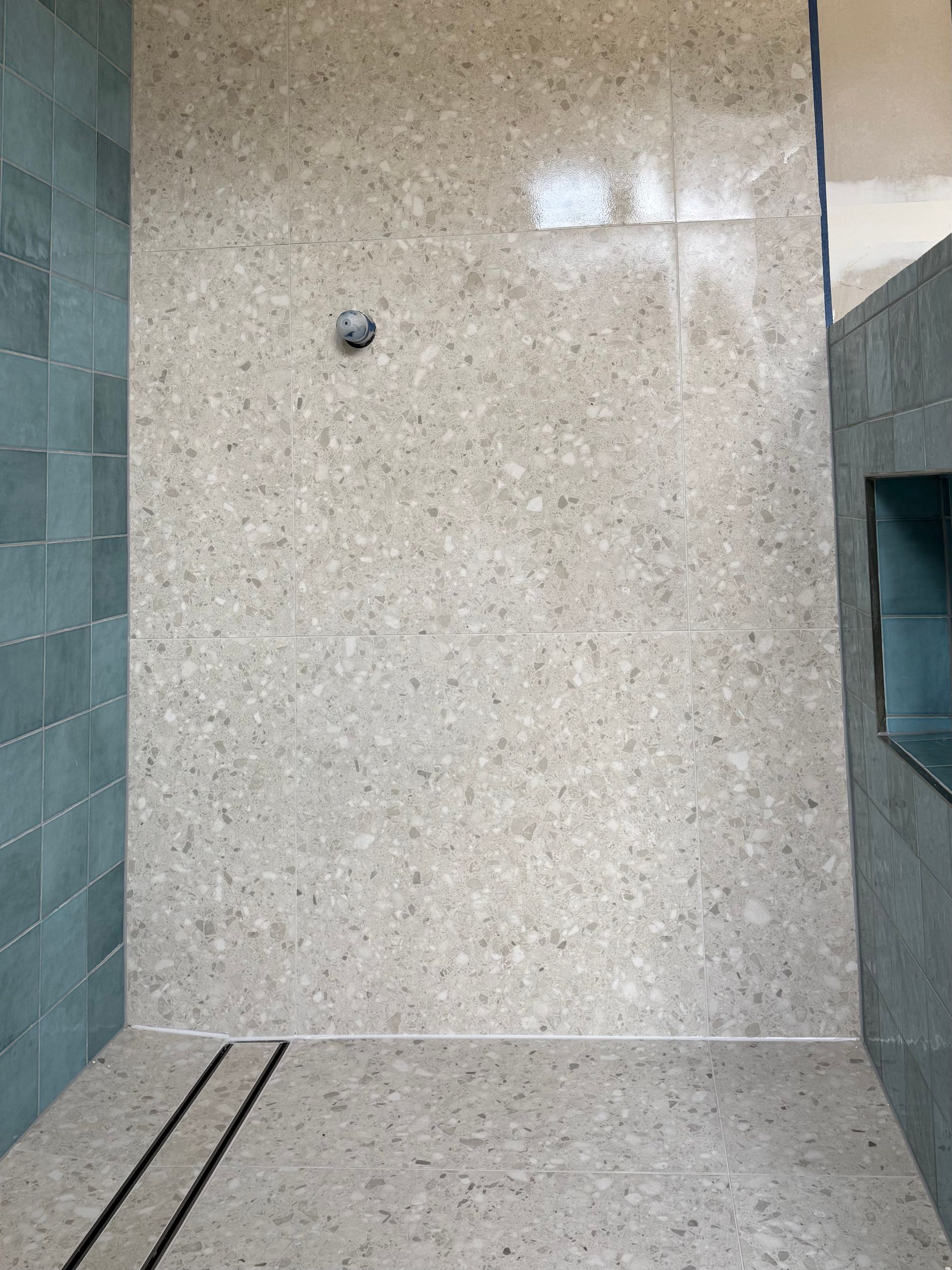 A neutral coloured bathroom fully tiled — Seeto Tiling in Fingal Bay, NSW