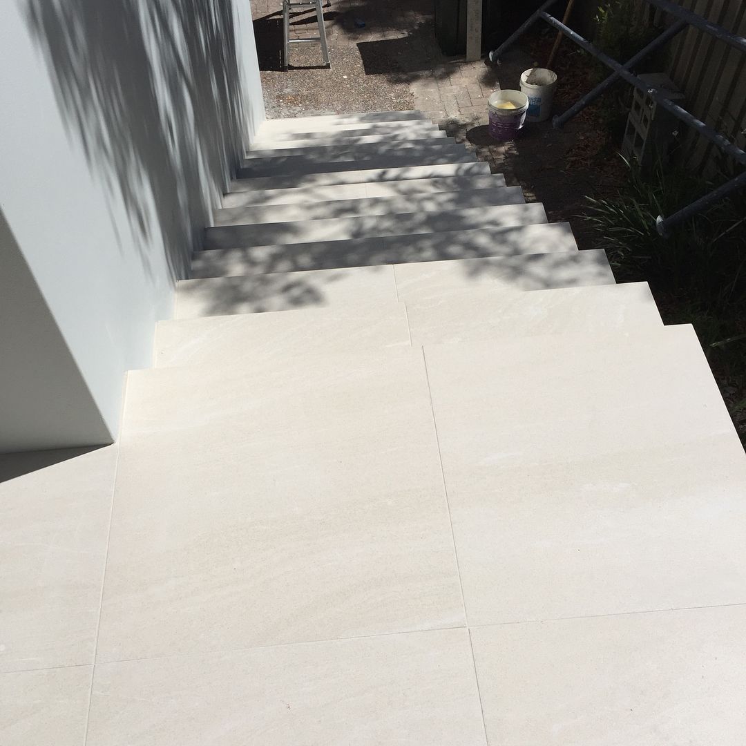 A stairway has had tiles laid down and is completed — Seeto Tiling in Fingal Bay, NSW