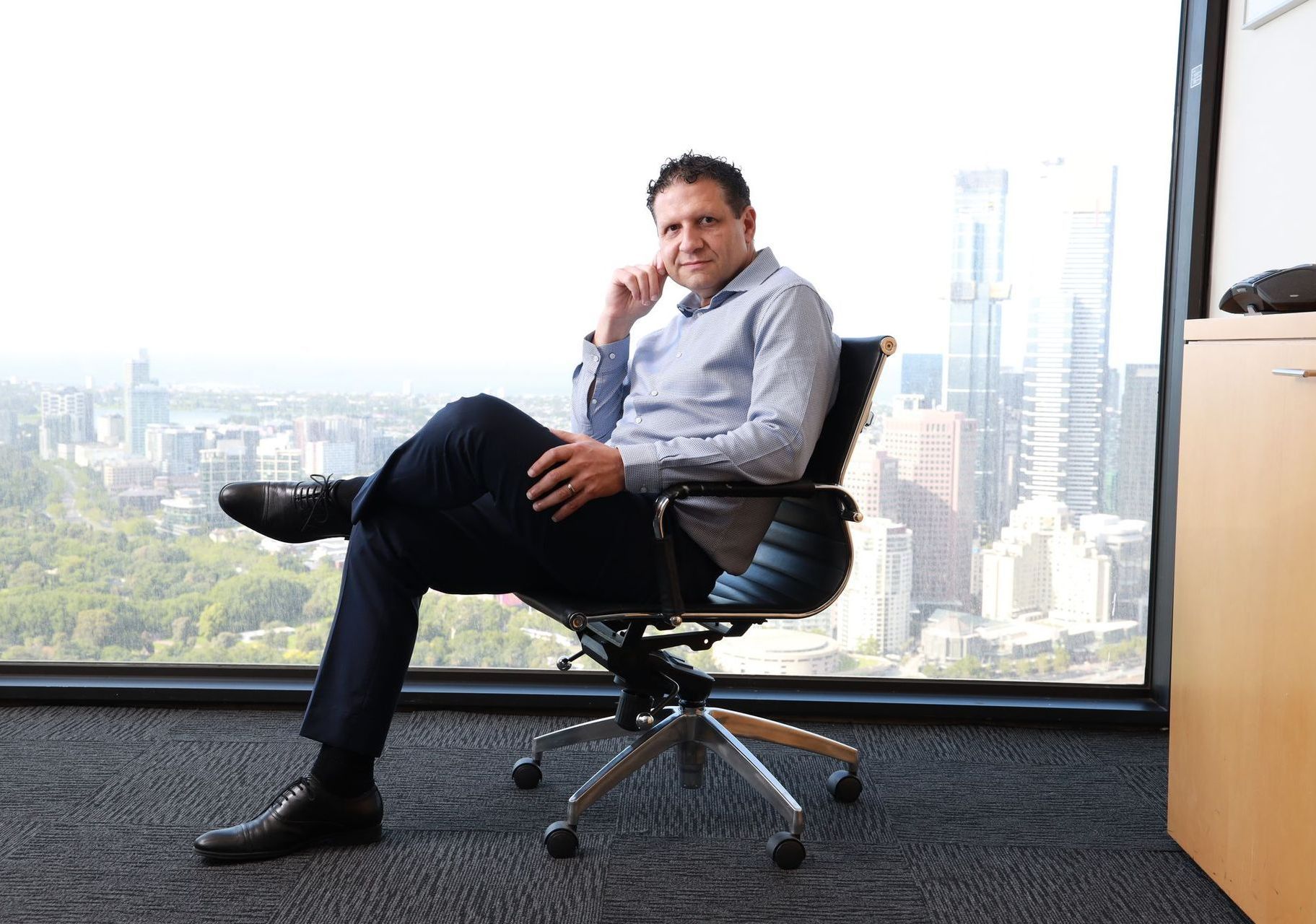 Mark Green sitting in an office chair
