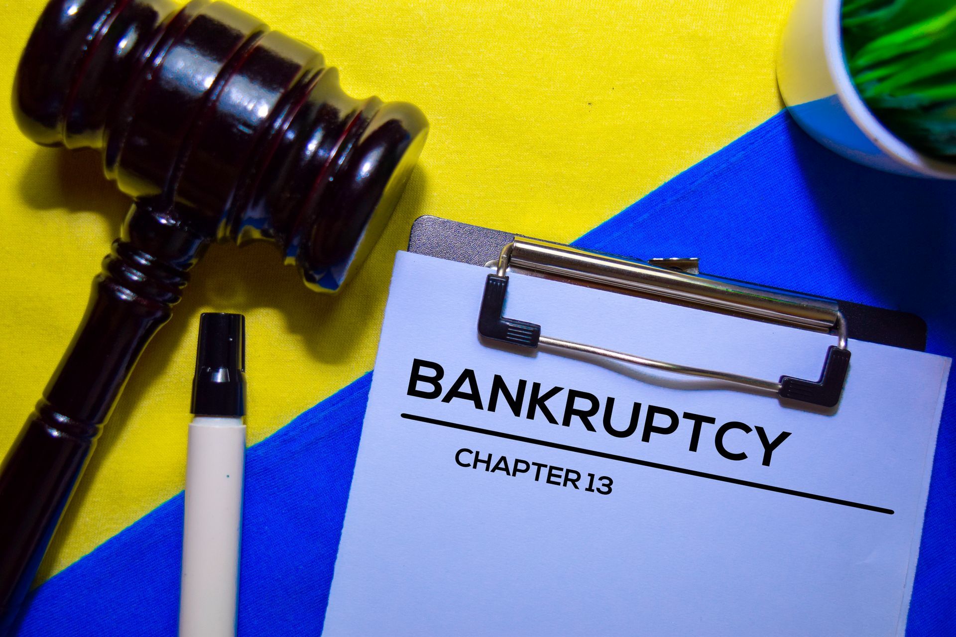 Bankruptcy Chapter 13 text on Document form and Gavel isolated on office desk | Cumberland MD Bankruptcy Chapter 13 text on Document form and Gavel isolated on office desk | Cumberland MD