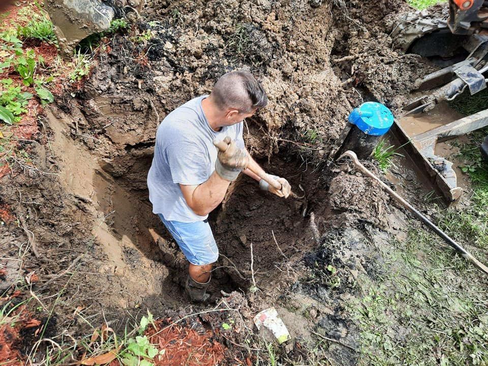Man Digging The Soil — Nazareth, PA — Keystone Pump & Well Service