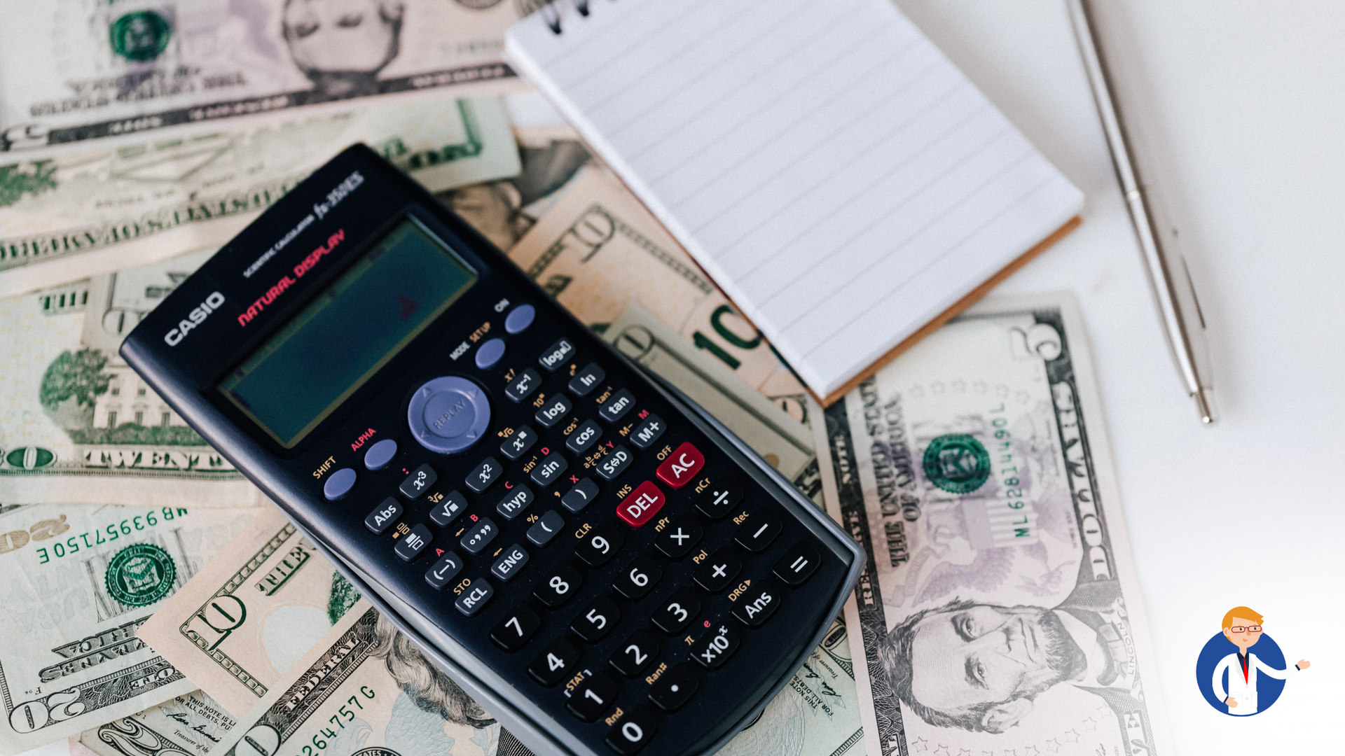 A calculator is sitting on top of a pile of money