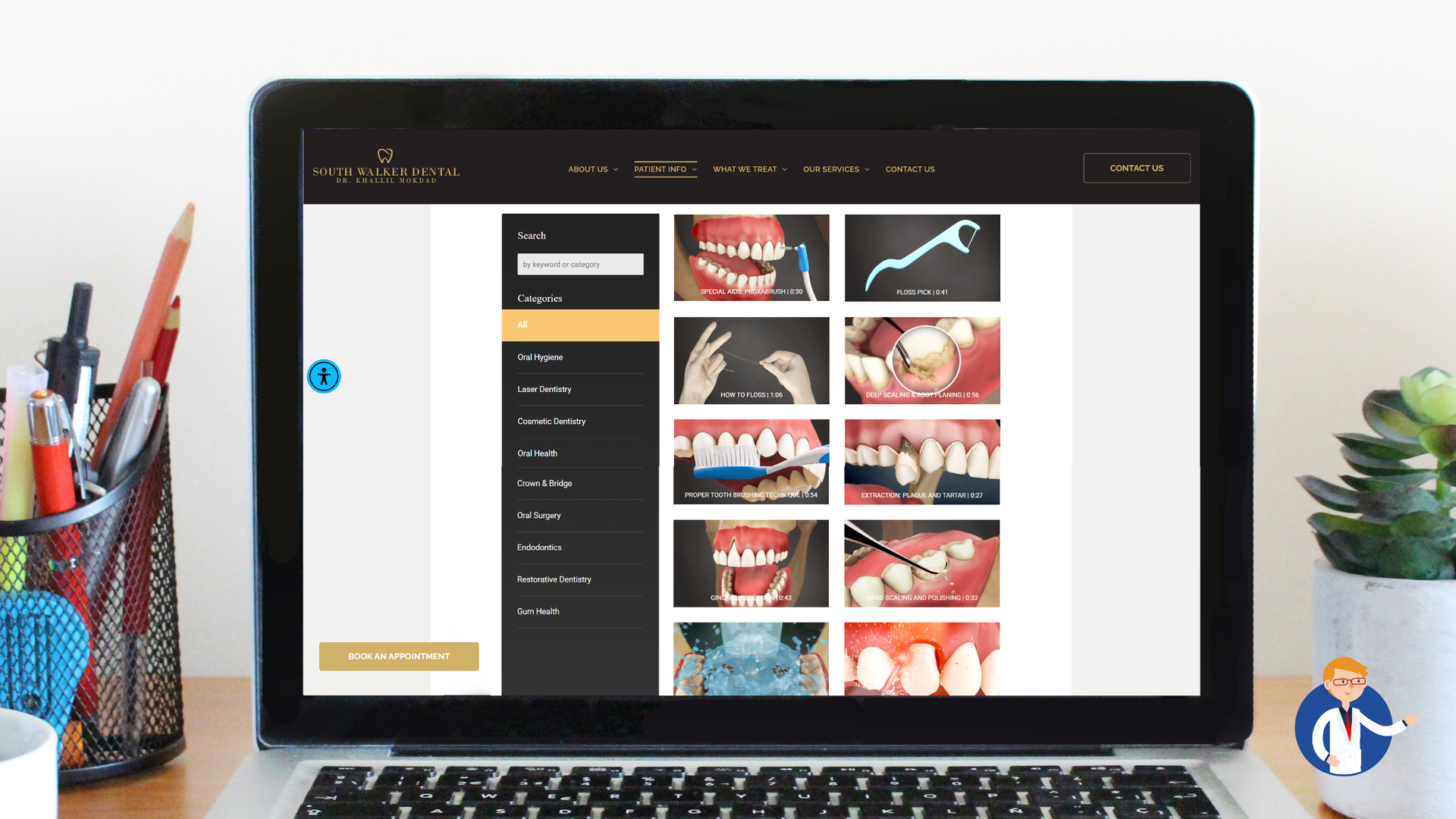 Laptop displaying dental care educational videos; desk with supplies and plant.