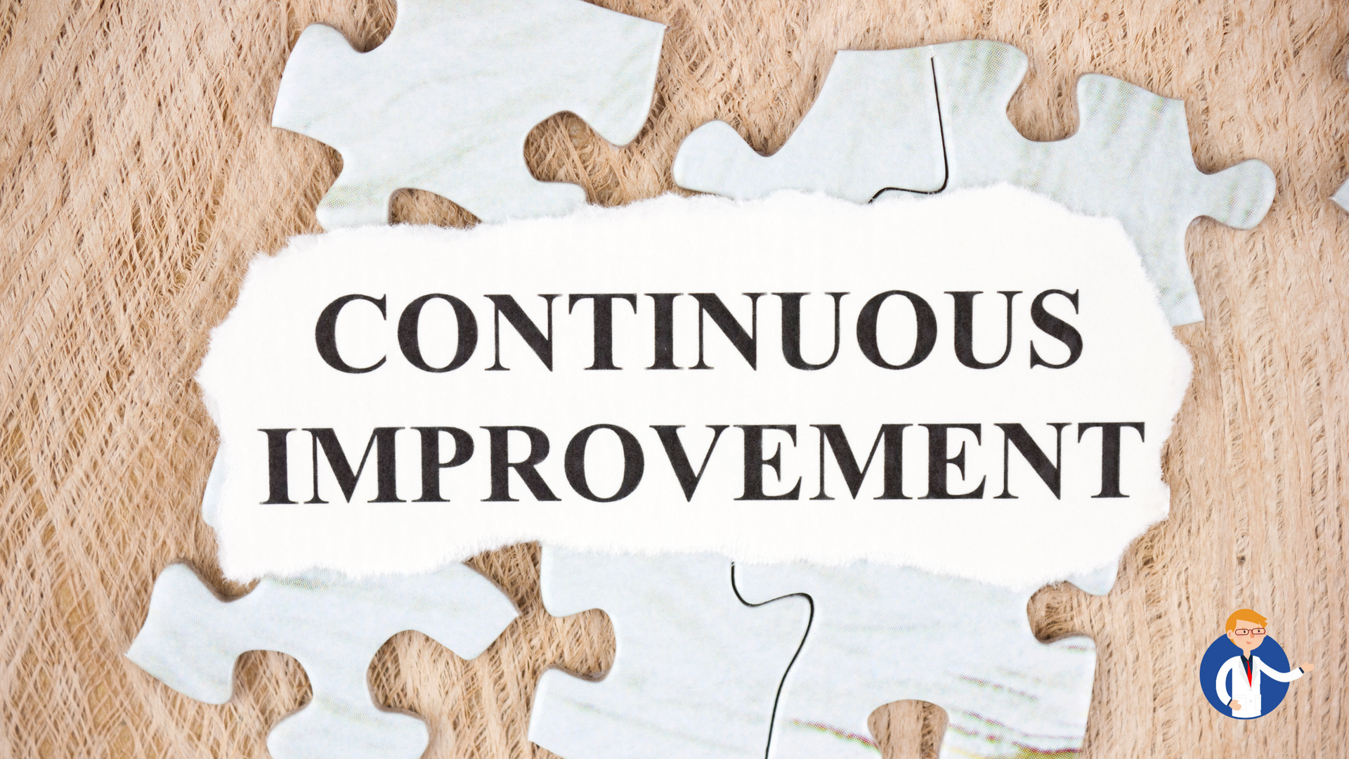 A piece of paper with the words continuous improvement written on it