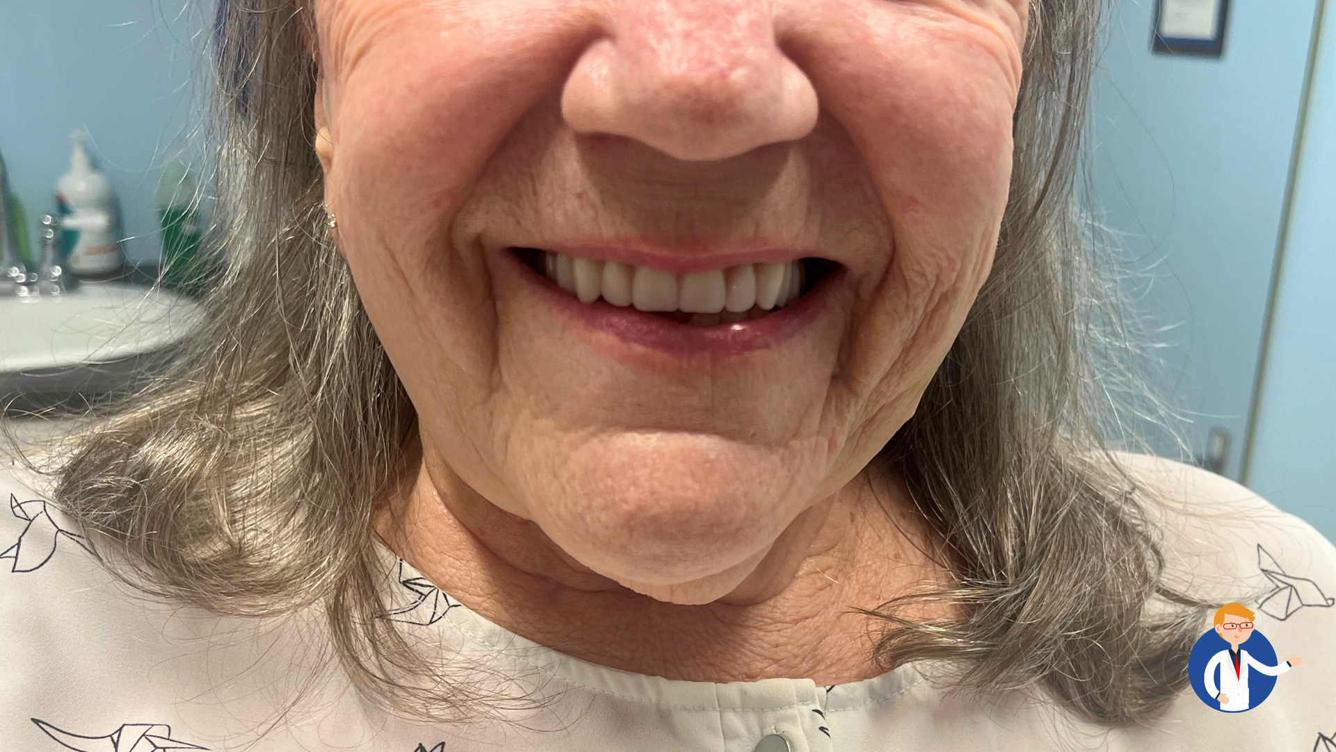 Smiling person with new teeth, in a dental office.