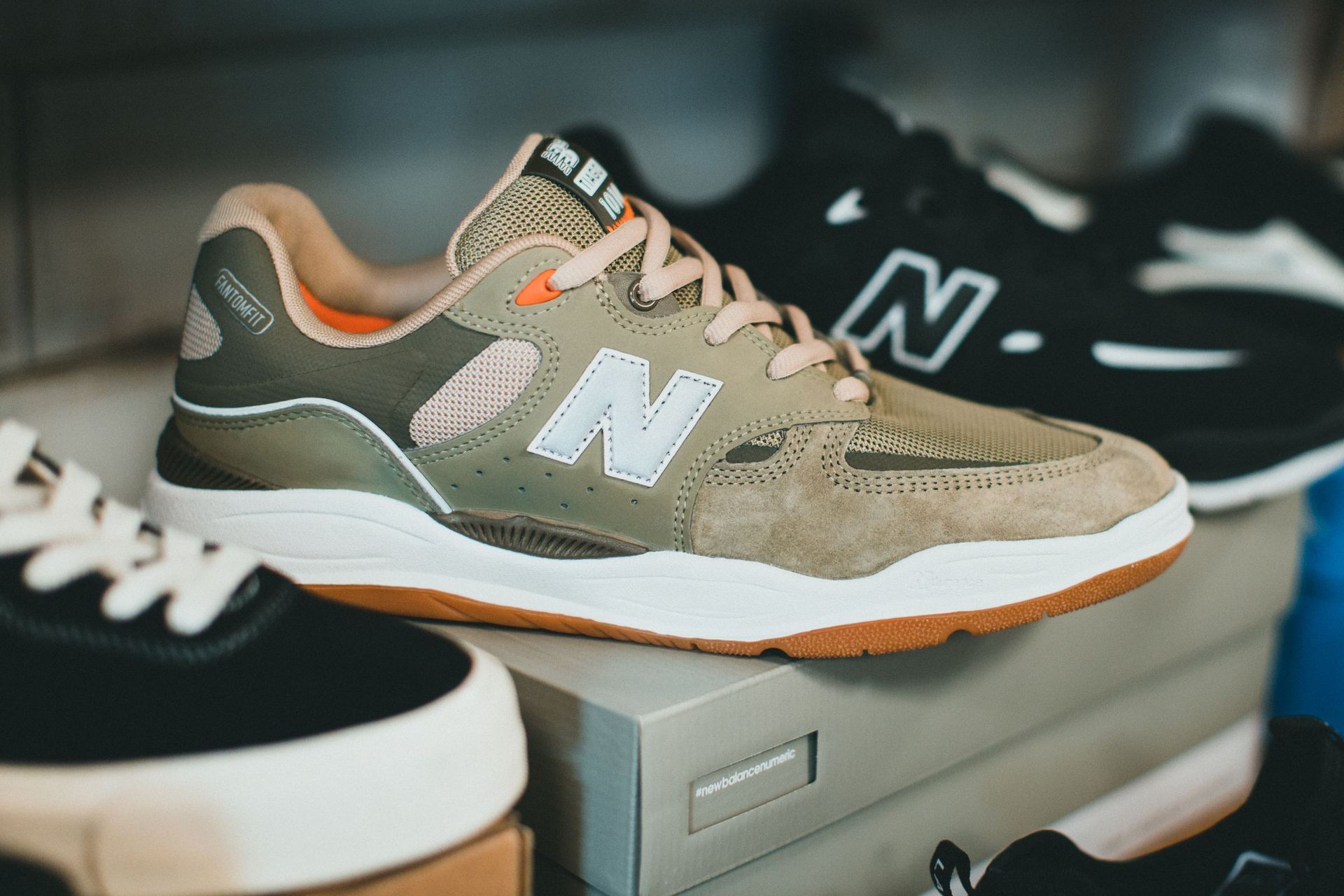 A New Balance sneaker photographed against a plain ground