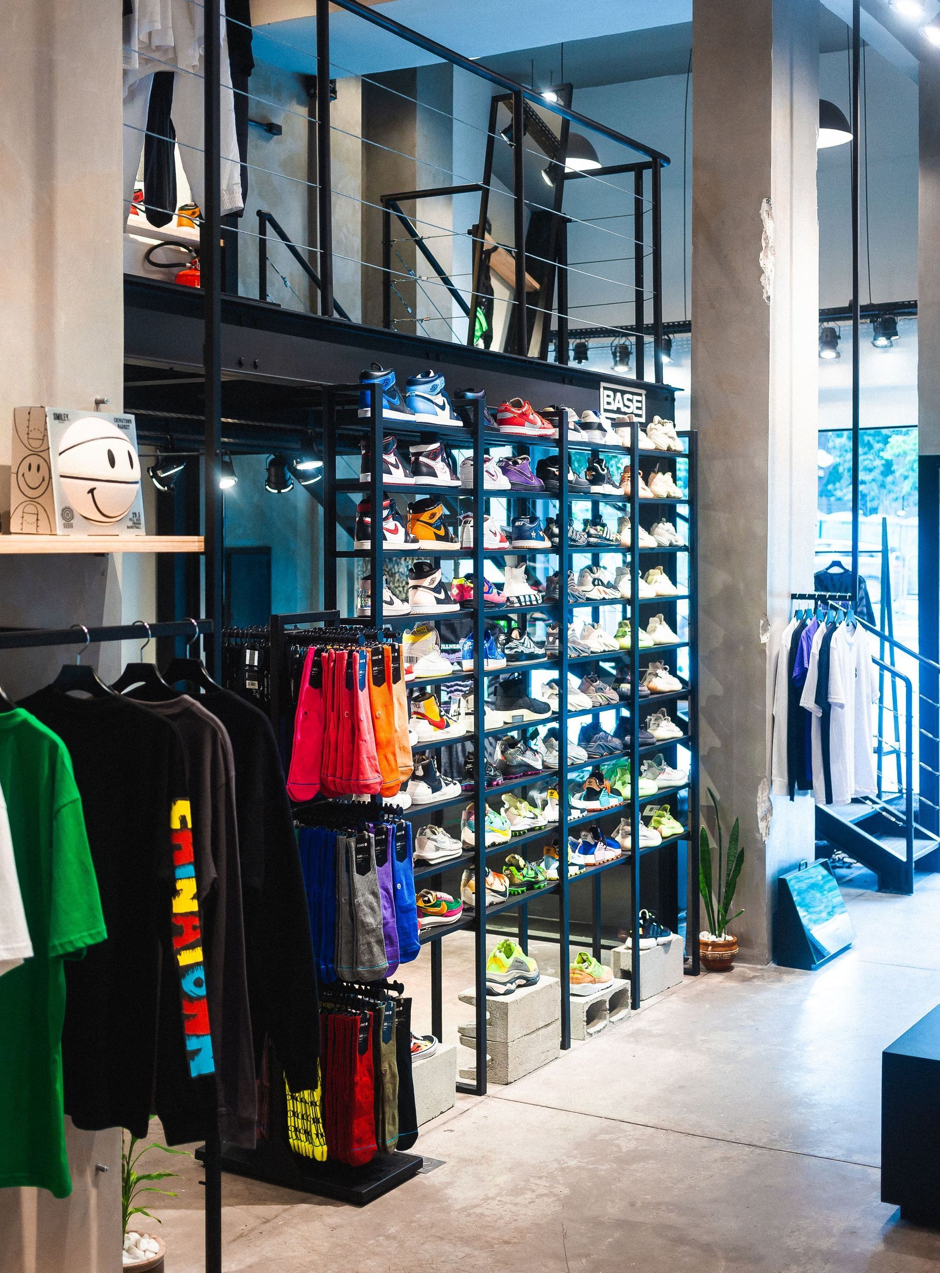 Inside the shop, sneakers lining the wall