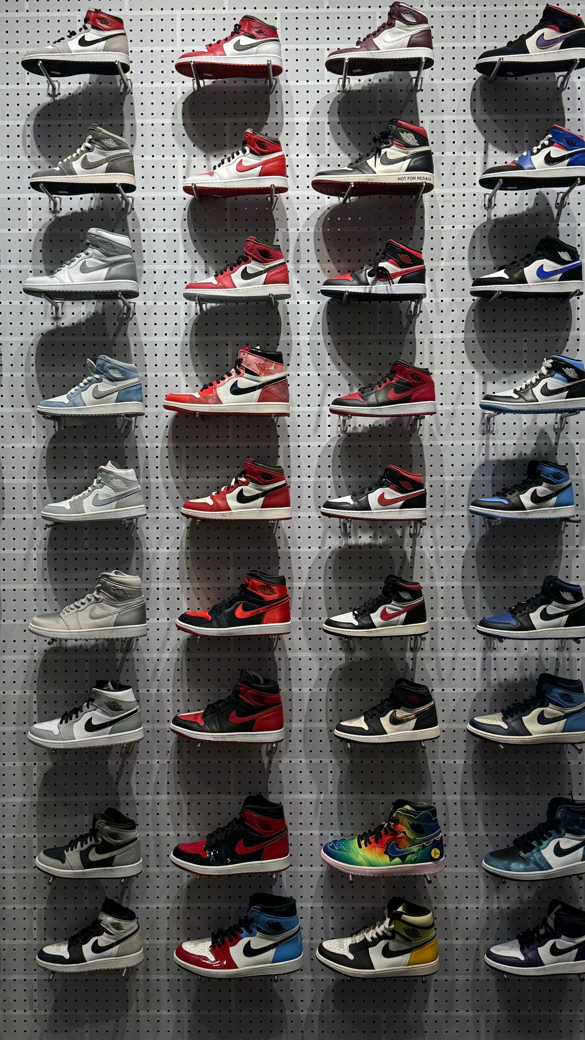 A shelf of sneakers in their boxes at the shop