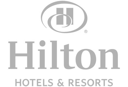 Hilton Hotels & Resorts logo in gray, featuring a stylized 