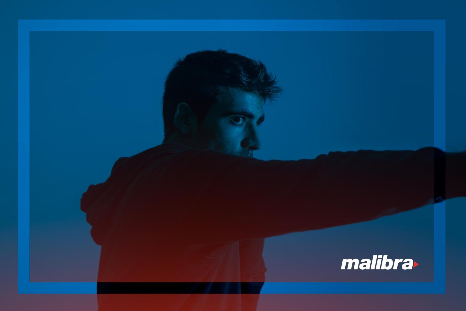 Man in red hoodie, arm extended, silhouette against blue and red gradient background. Malibra logo.