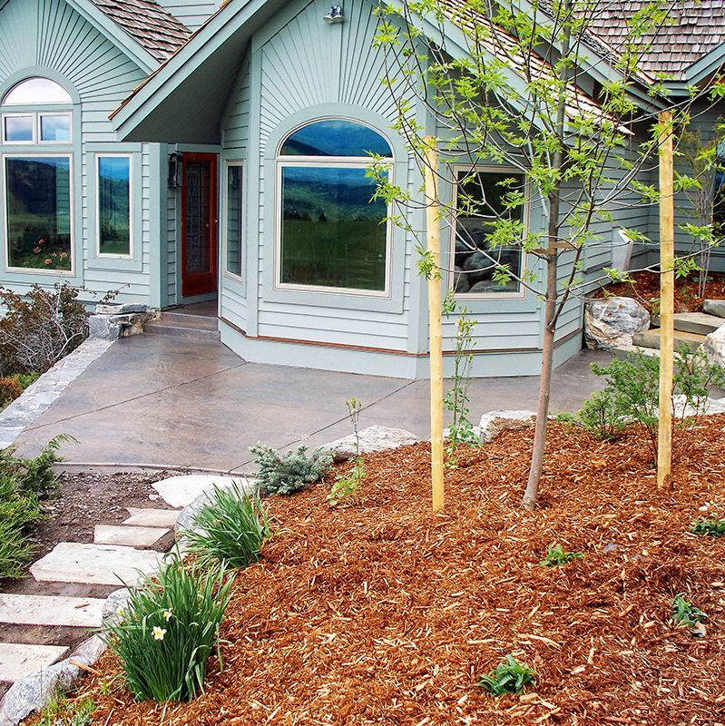Concrete patio with border and concrete stairs
