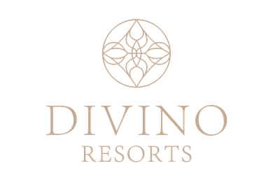 Divino Resorts logo with gold floral emblem and serif text on a white background