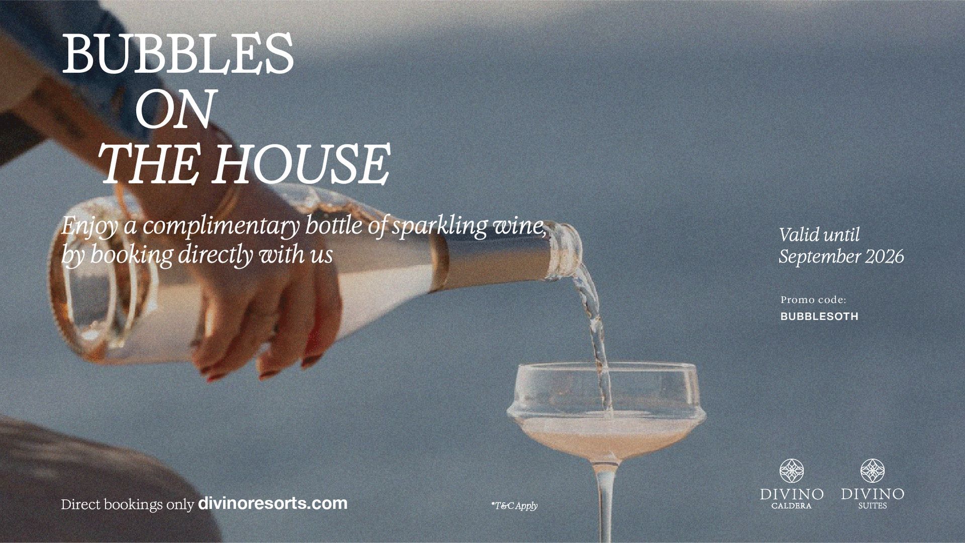 Hand pouring sparkling drink from bottle into coupe glass against blue sky with “Bubbles on the House” text
