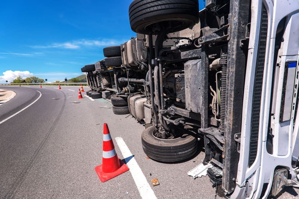 A Truck Has Turned Over On The Side Of The Road — Wilson's Towing In Westbrook, QLD