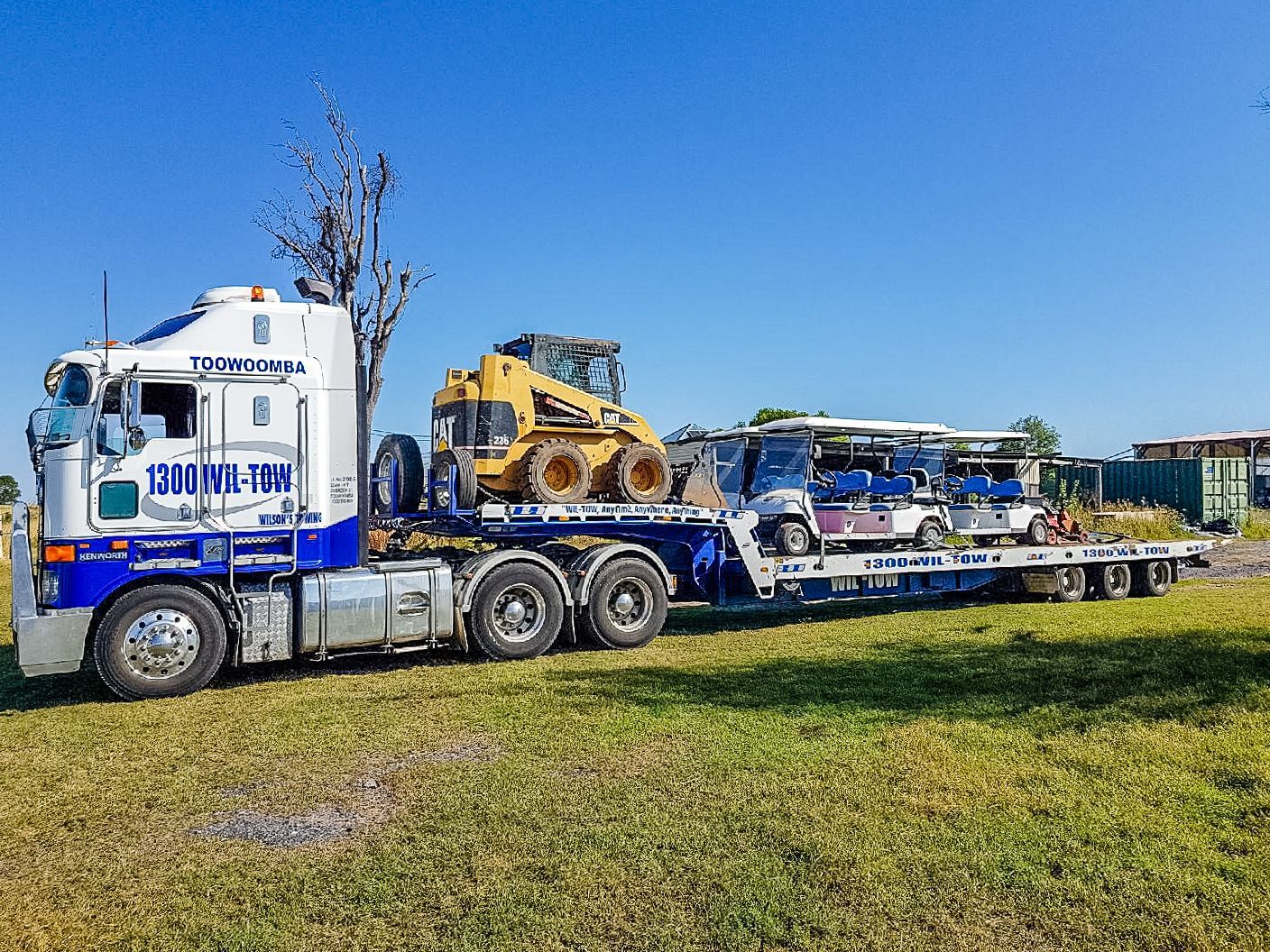 Tow Truck in a Field — Wilson's Towing In Withcott, QLD