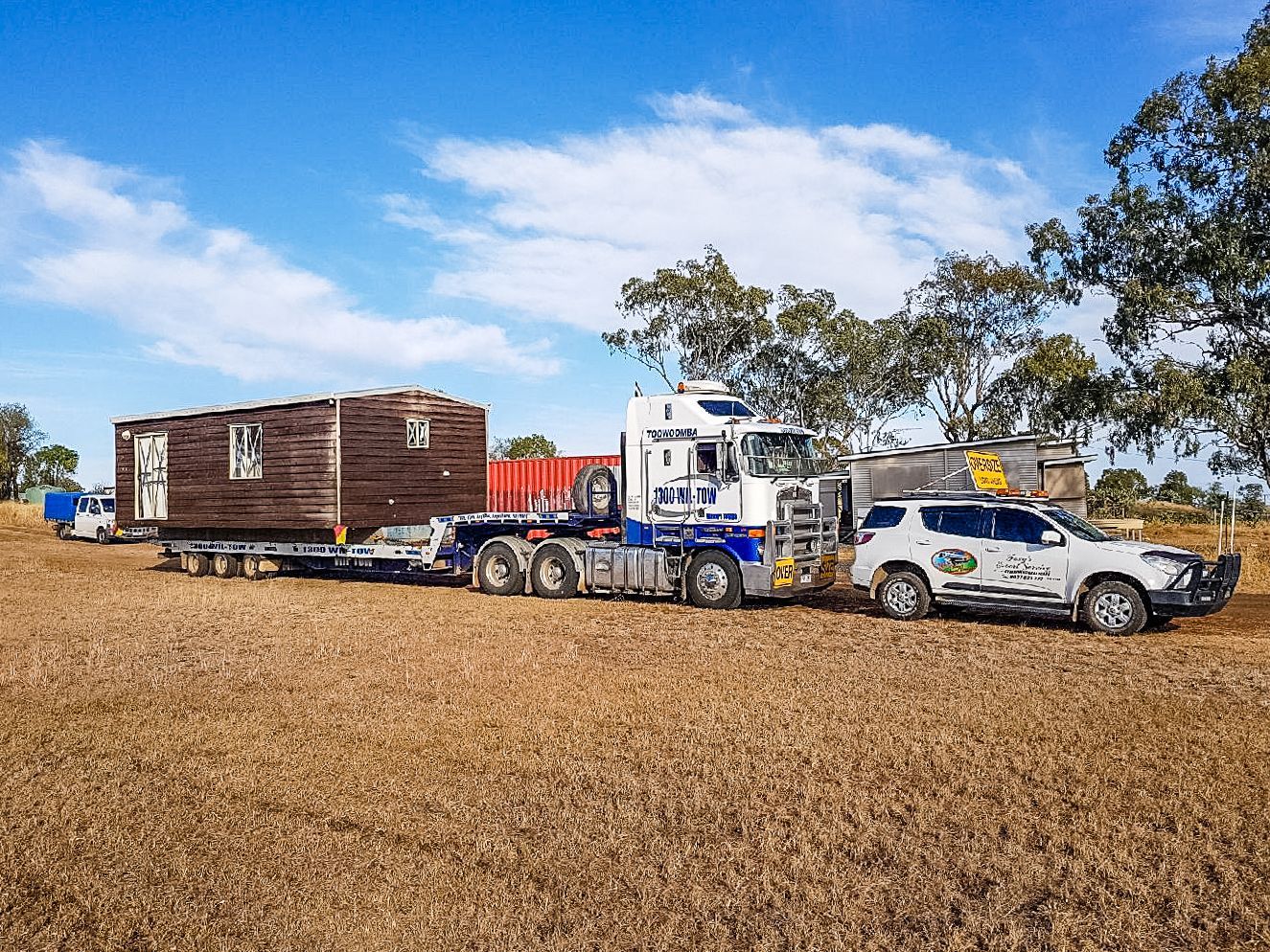 A Car Pulling A Trailer— Wilson's Towing In North Toowoomba, QLD